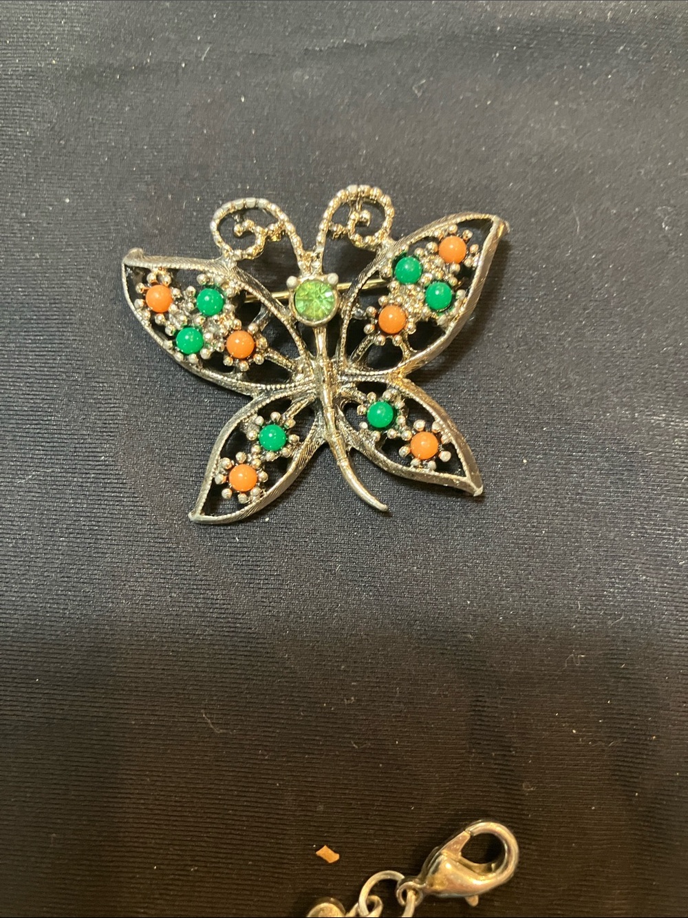 Vintage Sarah Coventry Gold-Tone Butterfly Brooch with Green and Orange Accents